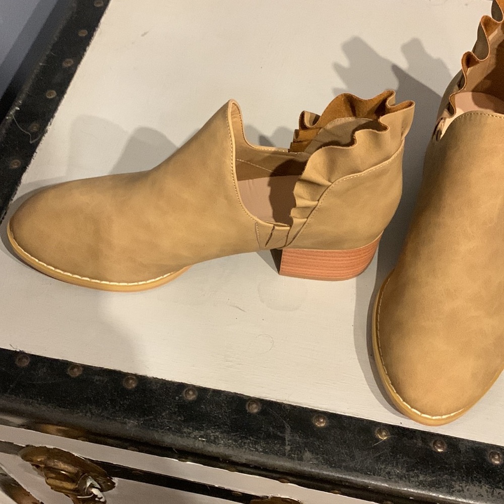 Tan suede size 8 clogs with side cut outs ; worn once